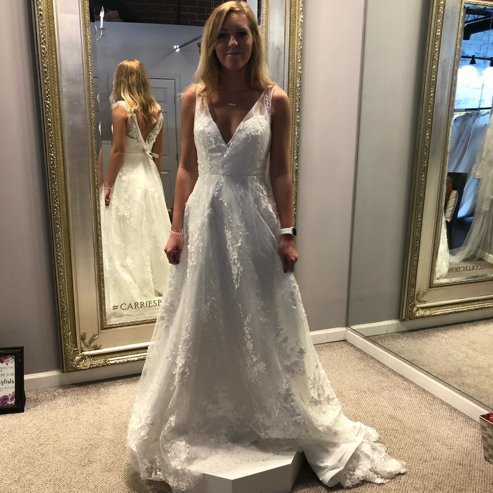 Unworn, unaltered wedding dress